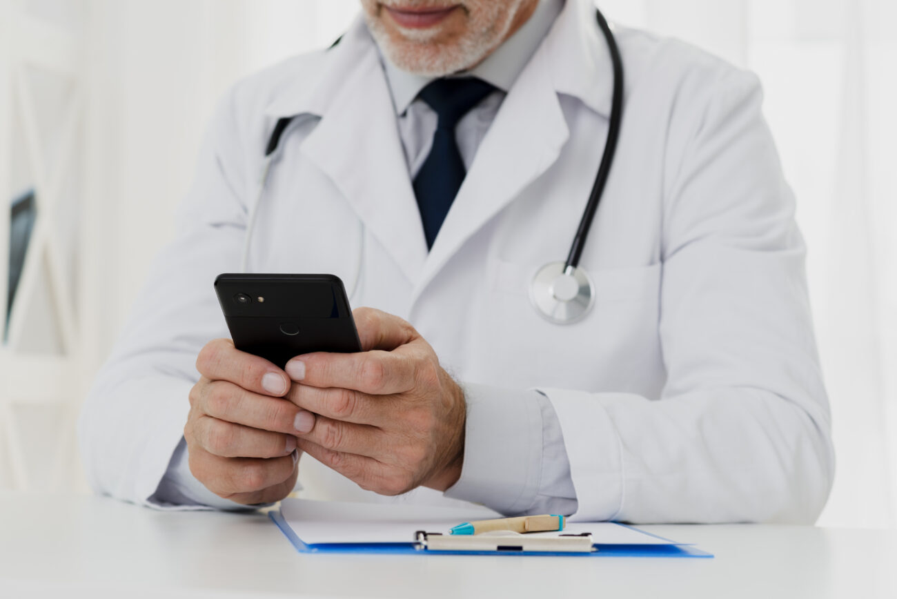 antibioest documents site doctor using his phone